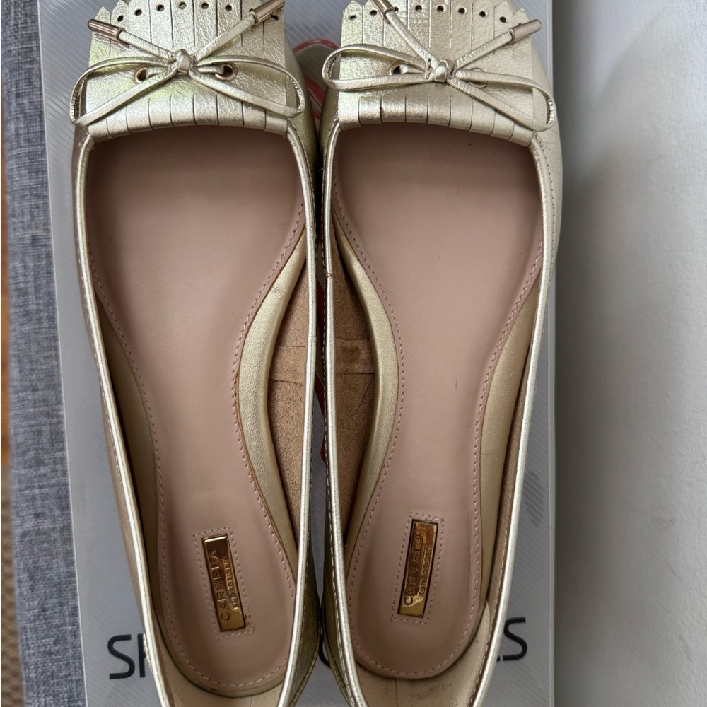 Carvela Gold Flats with Bow and Moccasin Stitching